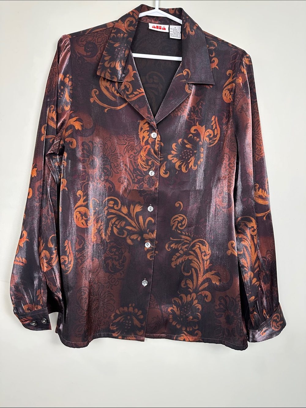127. Vintage Aaliyah rayon Polly blouse.